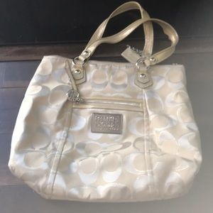 Gold coach purse